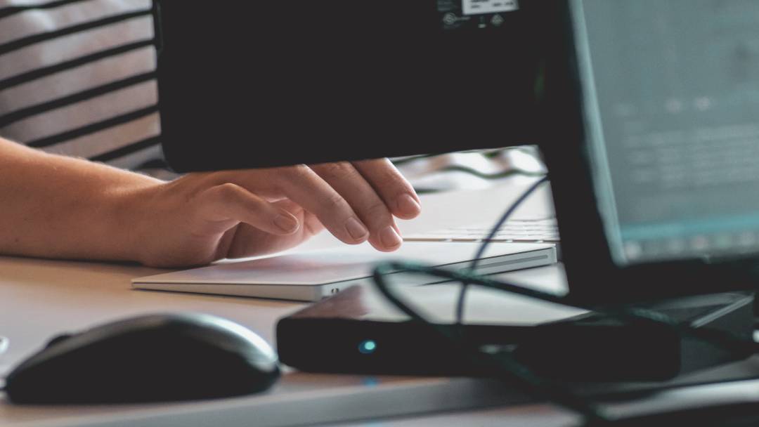 A man sitting at his work desk