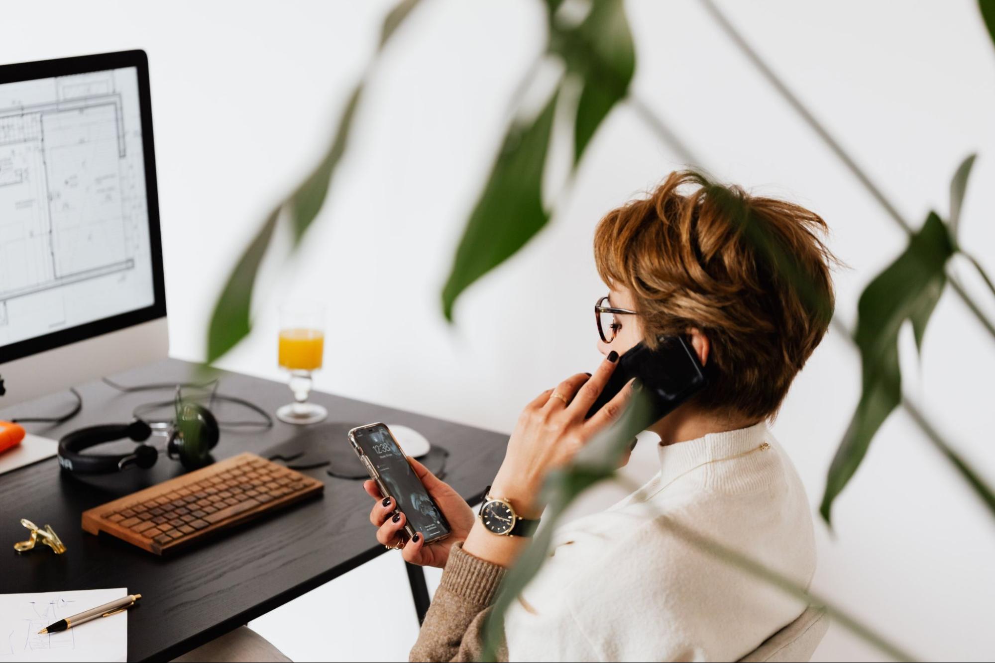 office staff answering calls from her business phone system installed by one of the Microsoft teams direct routing partners she chose to work with