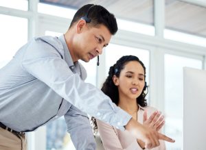 Business professional reviewing contracts and services from the biggest telecom companies in Canada to improve communication costs.