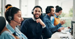 SE Telecom telecommunications service provider support team smiling while managing Canadian multi-location deployments from a centralized platform