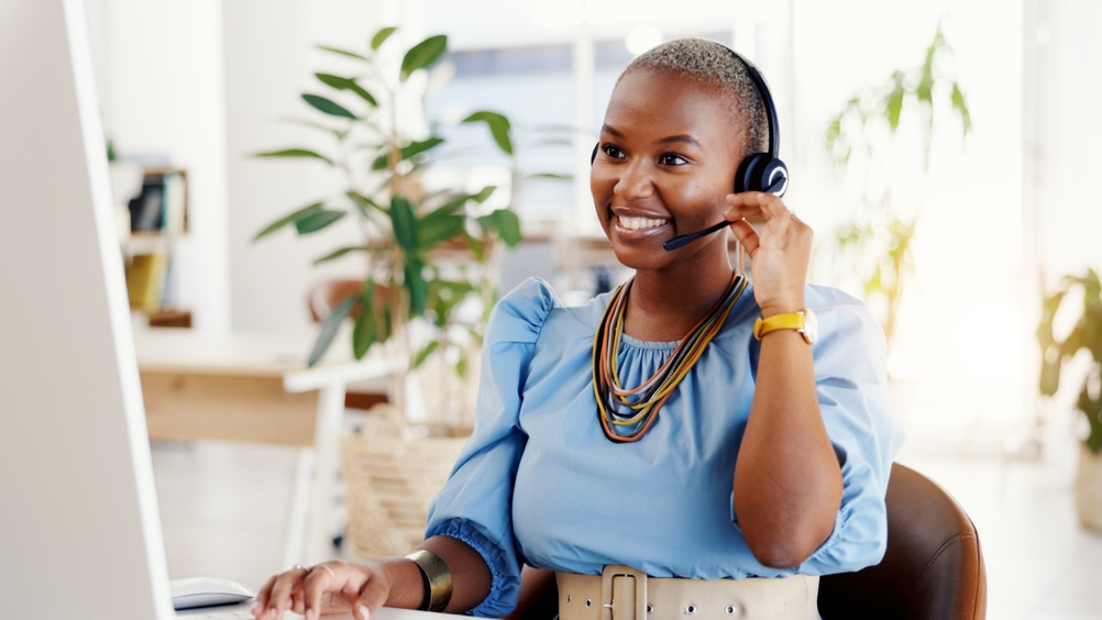 SE Telecom professional using a Canadian-hosted VoIP phone system — one of the leading VoIP companies in Canada
