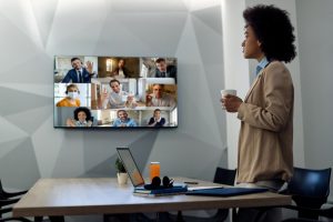 Canadian IT decision-maker taking notes on how SE Telecom helps answer can Microsoft Teams replace a phone system during a remote business session