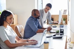 Call center agents speaking on VoIP systems