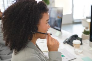 Call center agent talking on a VoIP headset