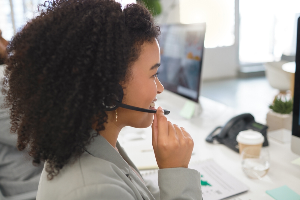 Call center agent talking on a VoIP headset