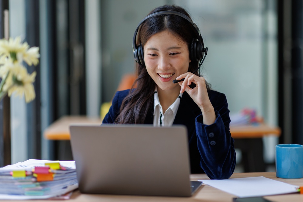 Remote worker taking a client call through one of many VoIP service providers