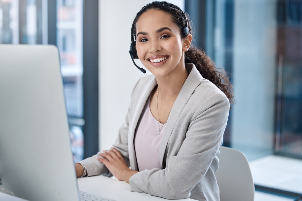 Professional using a headset with VoIP phone systems for business
