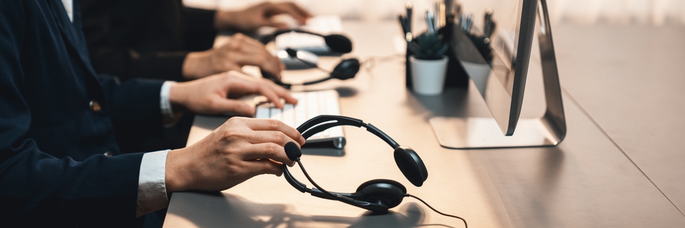 Customer service agents managing calls on a cloud communications platform using a wireless headset
