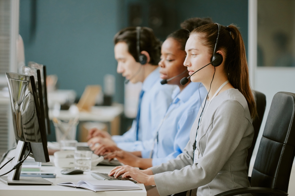 Business professional on a headset call supported by managed network services from SE Telecom